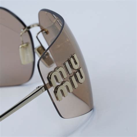 Miu Miu MU54YS ZVN20F BRAND NEW Sunglassses Pink .